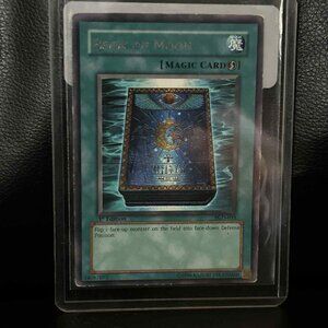 Book of Moon - PGD-035 - Rare - 1st Edition  Pharaonic Guardian Yu-Gi-Oh Trading